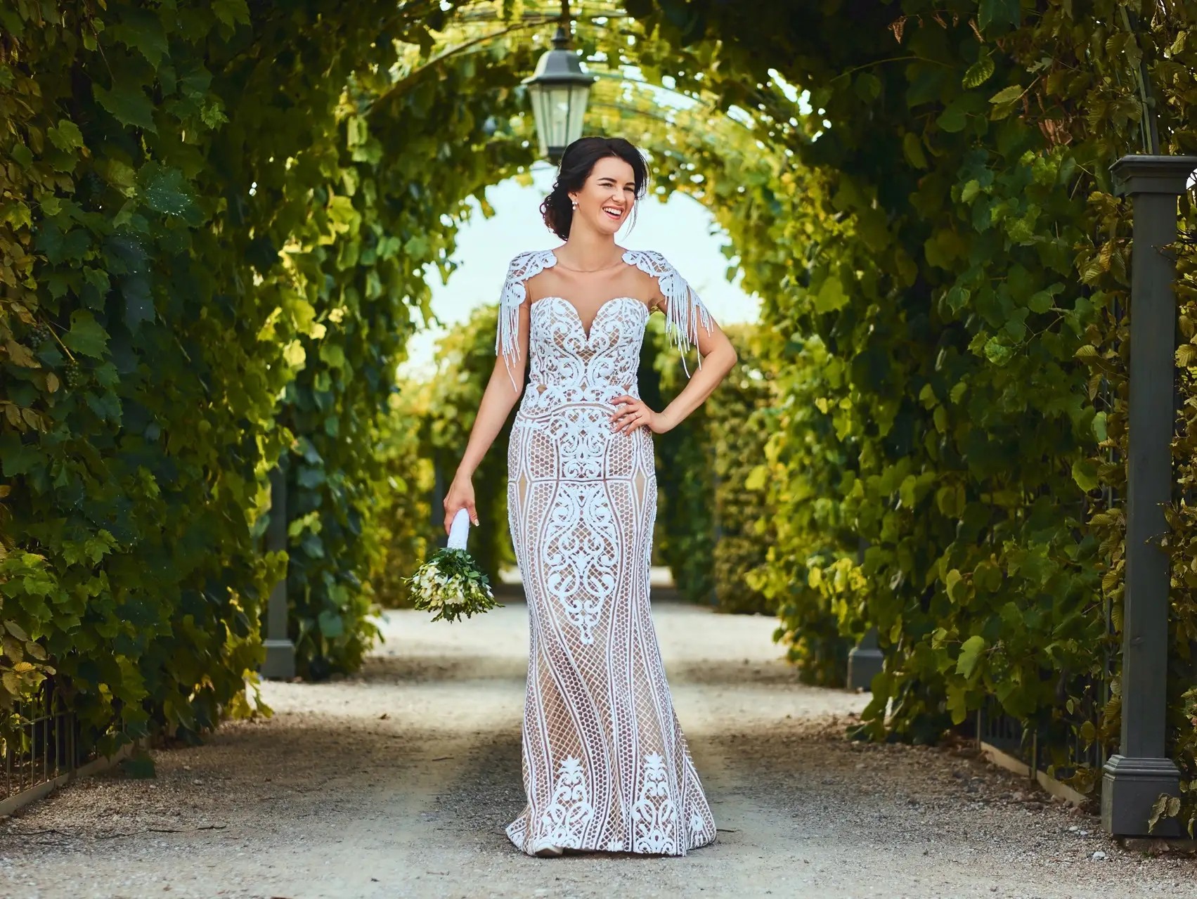 A Glimpse into the World of Bridal Couture: The Art of Crafting Exquisite Wedding Gowns. Desktop Image